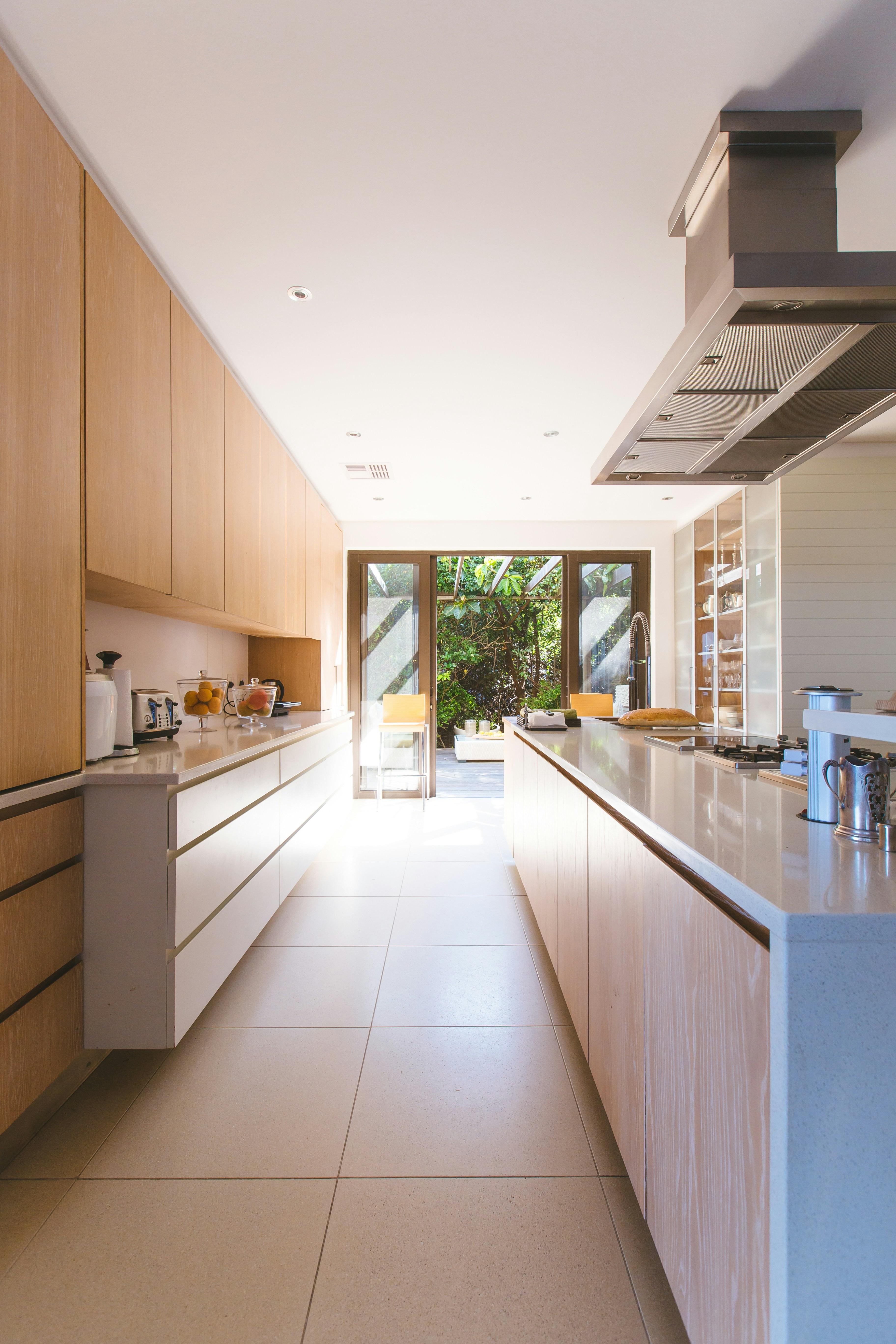 Modern kitchen with polished worktops after a professional deep clean
